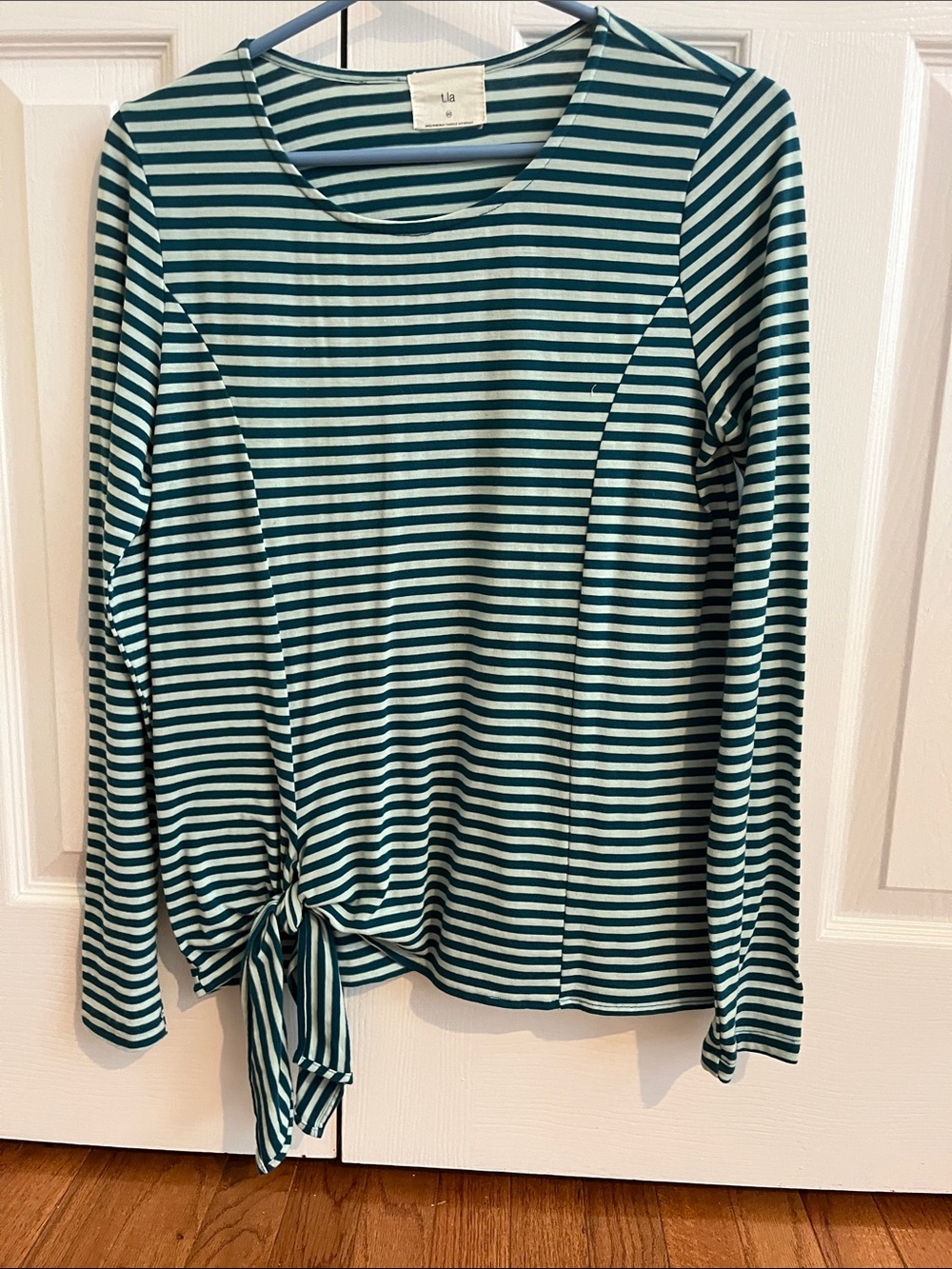 light green and teal striped long sleeve top with tie
